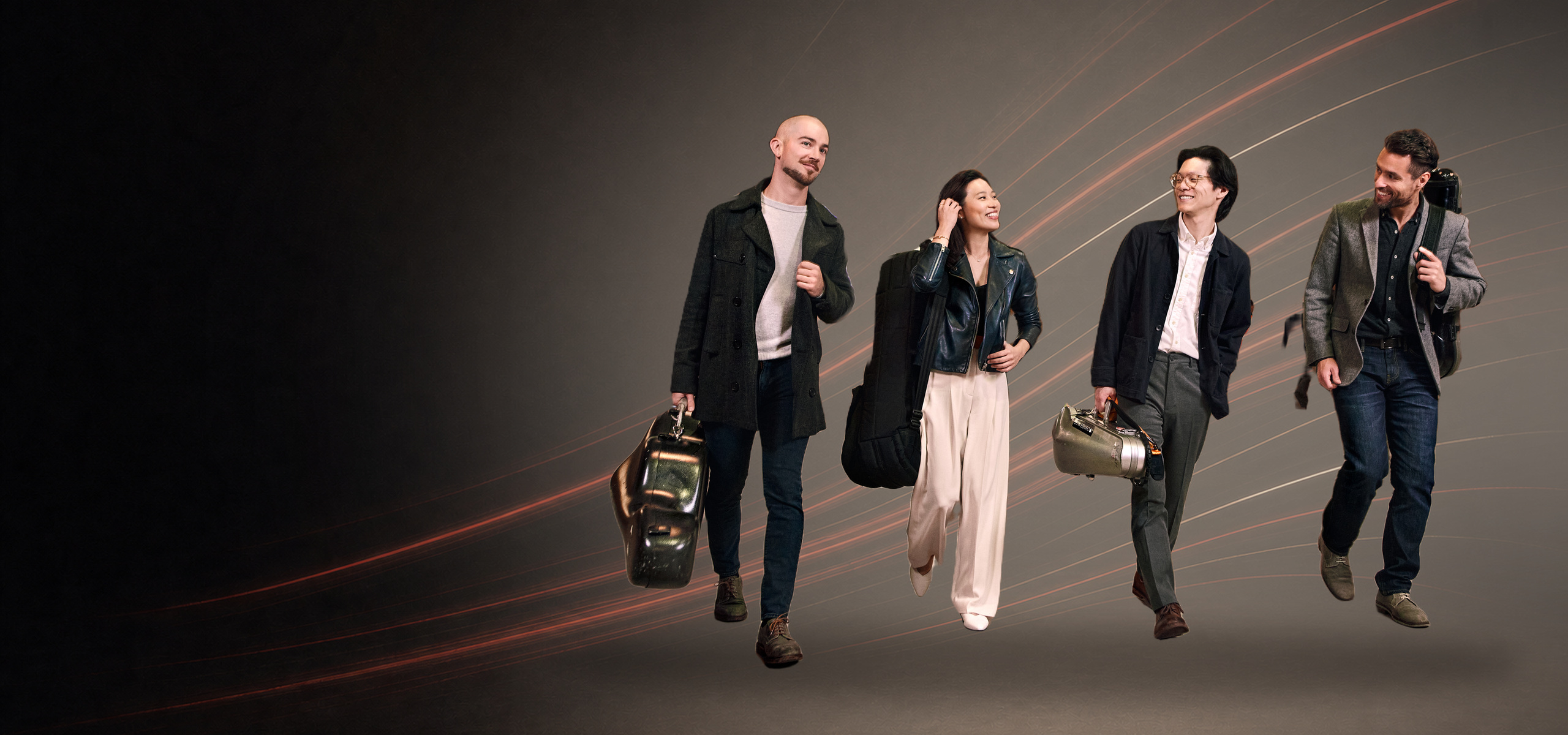 The Dover Quartet walking with their instruments